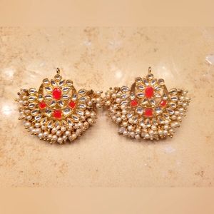 Fancy wedding/party earrings made of pearls and stones